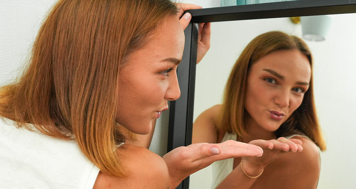 Olivia's nipples get hard in the mirror 