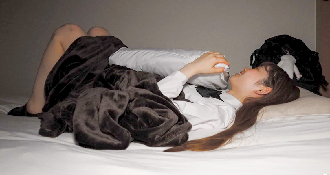 School girl carefully performs a blow job