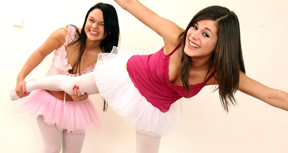 Two ballet girls undressing each other