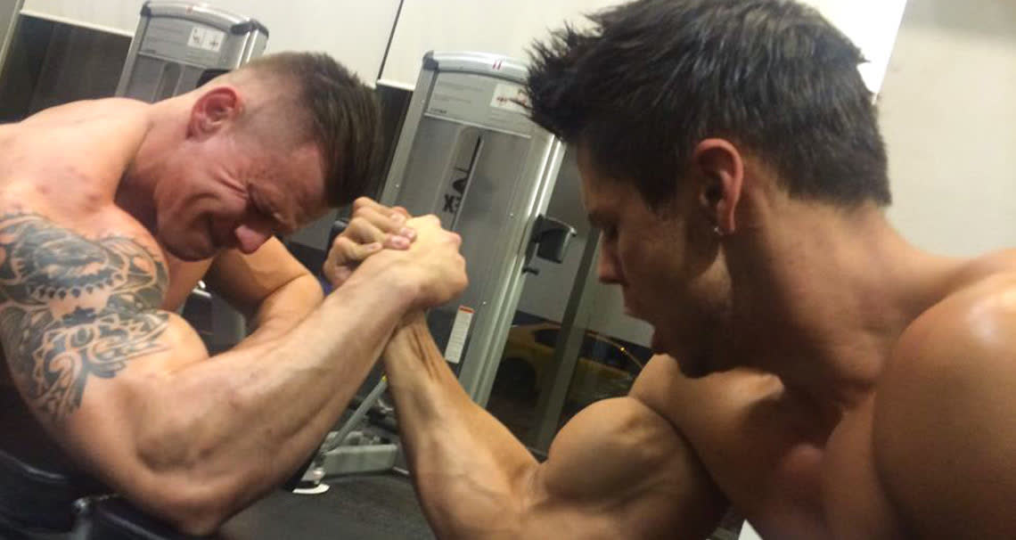 Amateur Fitness Guys Arm Wrestle in the Gym