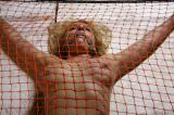 Bound and ballgagged babe fish-trapped scene photo 10