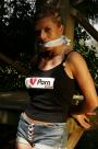Hottie tied and cleavegagged outside scene photo 5