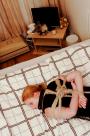 Linda hard-tied on the bed scene photo 9