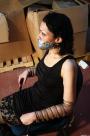 Distressed damsel chair-tied tapegagged scene photo 7