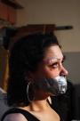 Distressed damsel chair-tied tapegagged scene photo 9