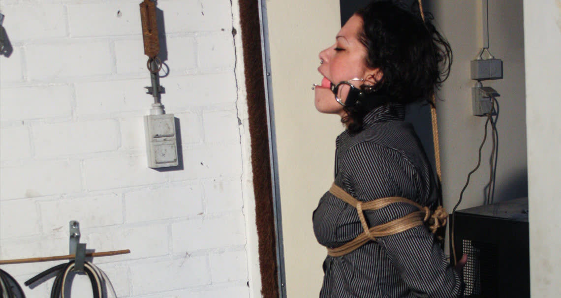 Steffi Dangling on Rope Tightly Ballgagged