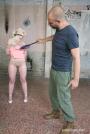 Submissive Lovita struggles while getting whipped scene photo 6