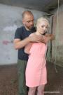 Submissive Lovita struggles while getting whipped scene photo 2