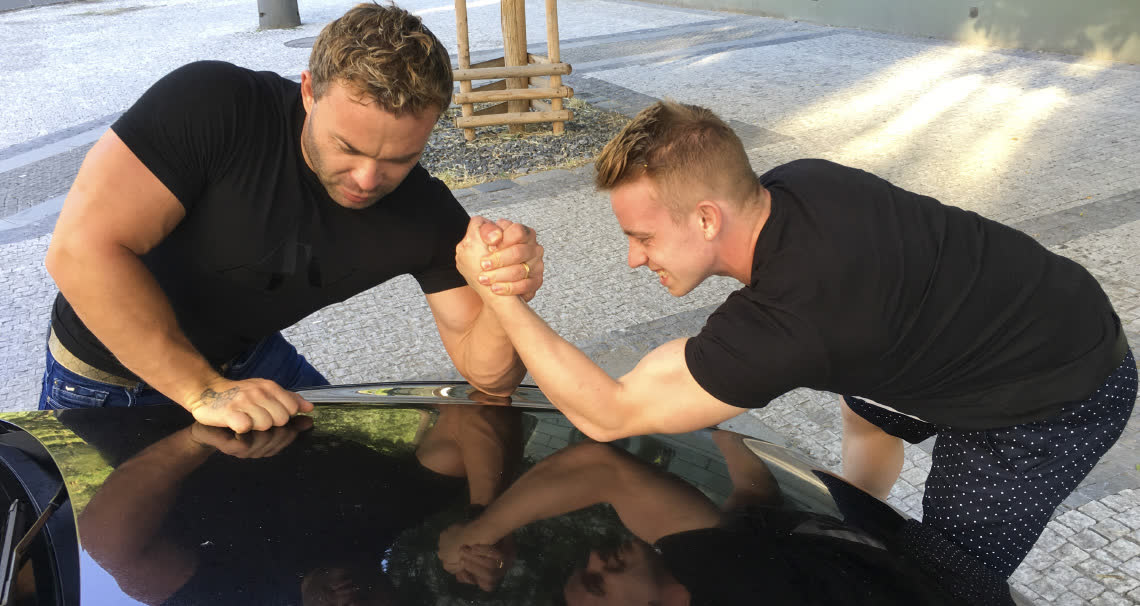 Sexy Guys Flexing Their Muscles on the Street